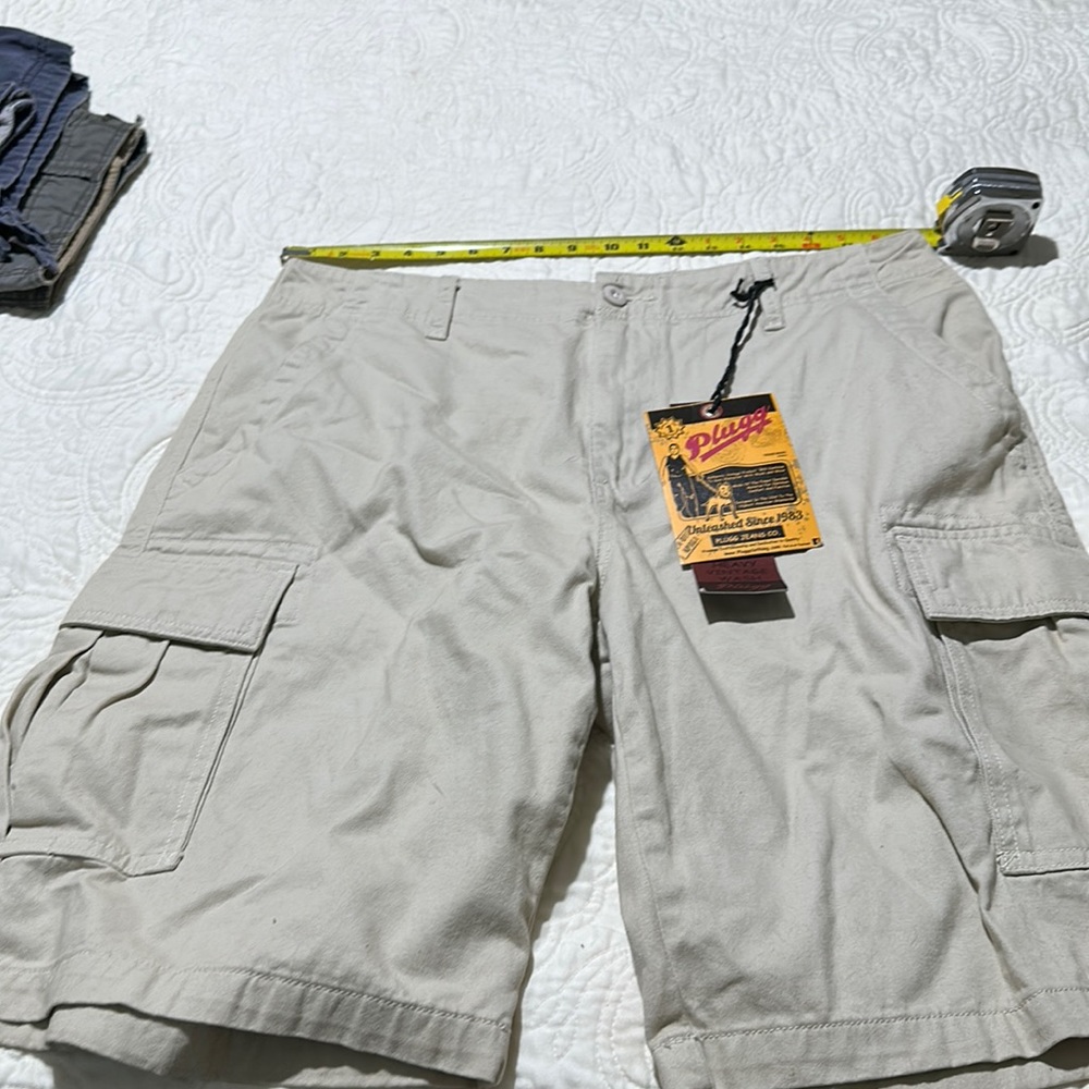 Plugg shorts tag shows 31 but measures 40
